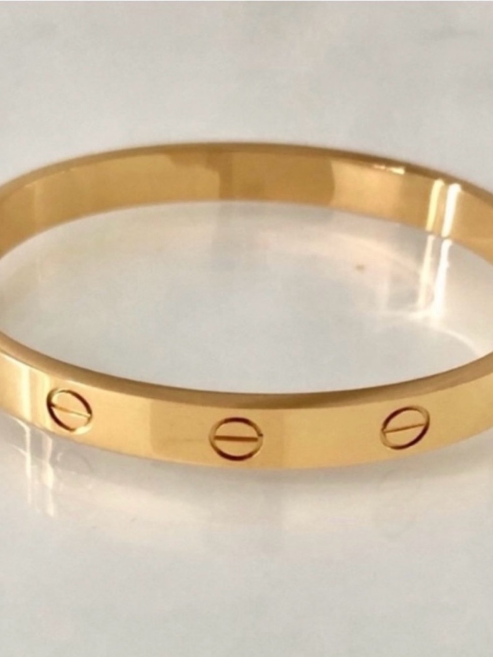 Gold Bangle Bracelet without stones. Stainless steel gold plated.